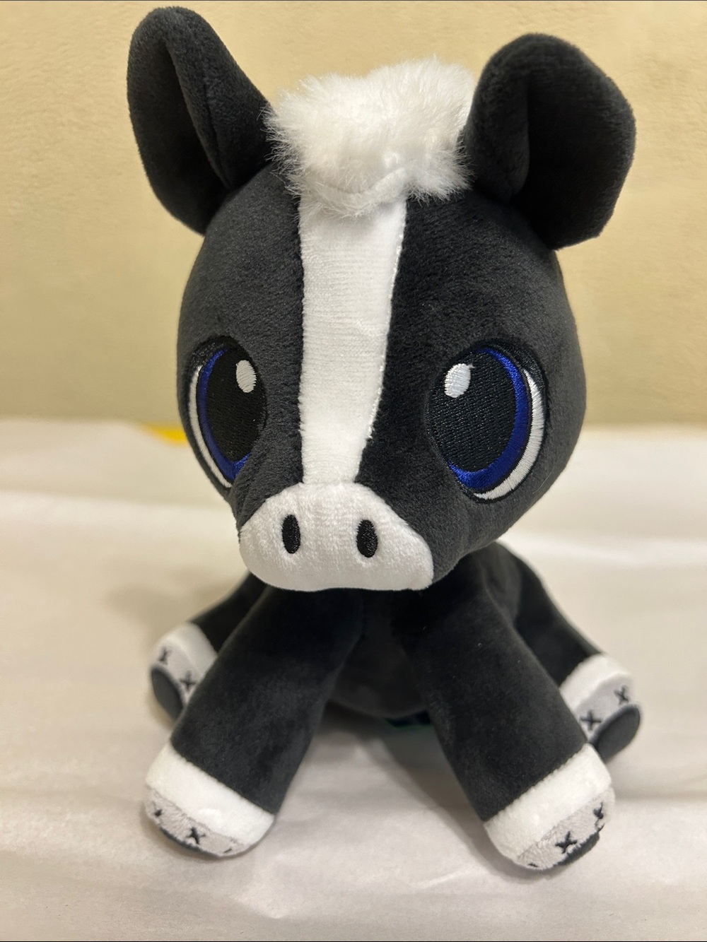 Black & White Plush Horse Toy with Blue Eyes - Brand Unknown